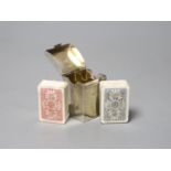 A late Victorian silver playing card case, containing two later? packs of playing cards, Henry