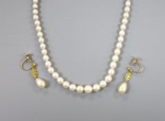 A single strand and graduated cultured pearl necklace, with marcasite set clasp, 44cm and a pair