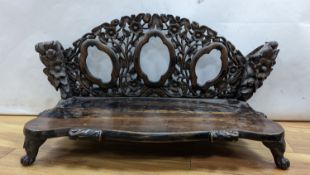 An early 20th century Chinese carved hardwood stand 85cm wide