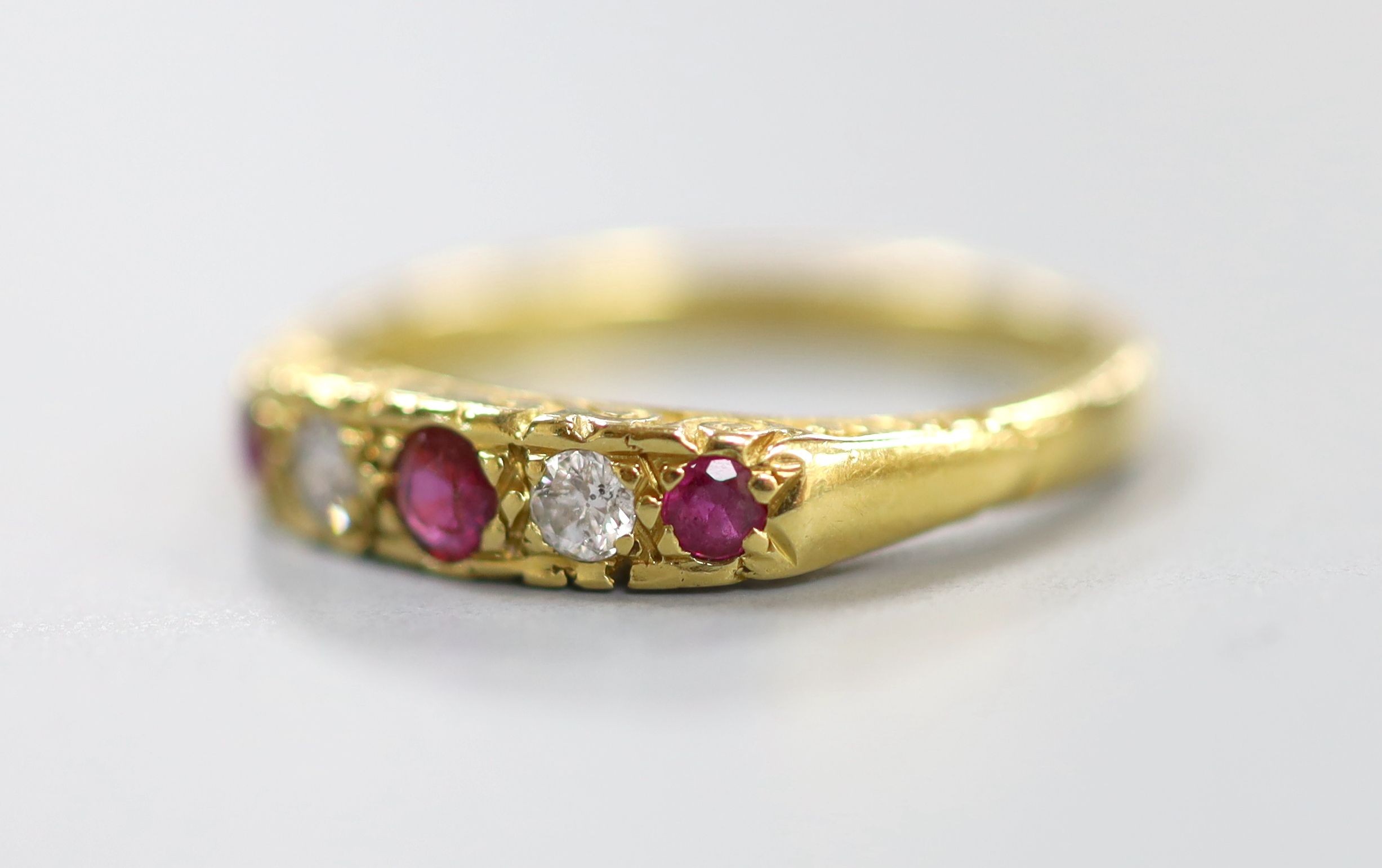 A modern 18ct gold, two stone diamond and three stone ruby half hoop ring, size O, gross weight 3. - Image 2 of 3
