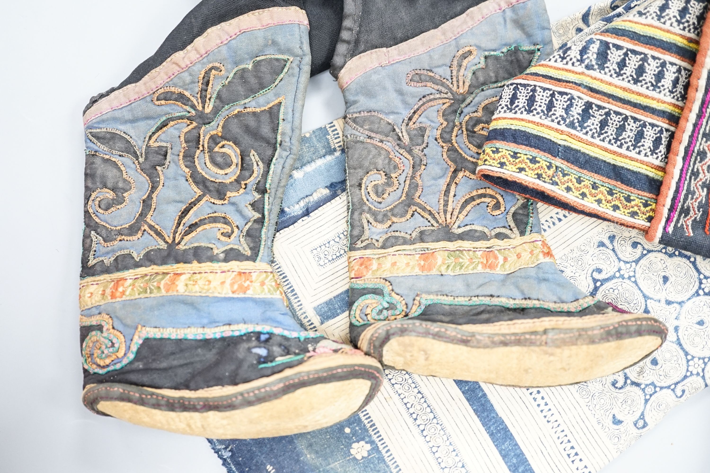 A pair of Chinese embroidered "bound" boots, a multi-coloured woven hat printed panel, damask silk - Image 2 of 6