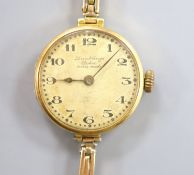 A lady's early 1920's 18ct gold Rolex manual wind wrist watch, with case back inscription, on a