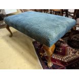 An upholstered footstool. W-117cm, D-73cm, H-44cm.