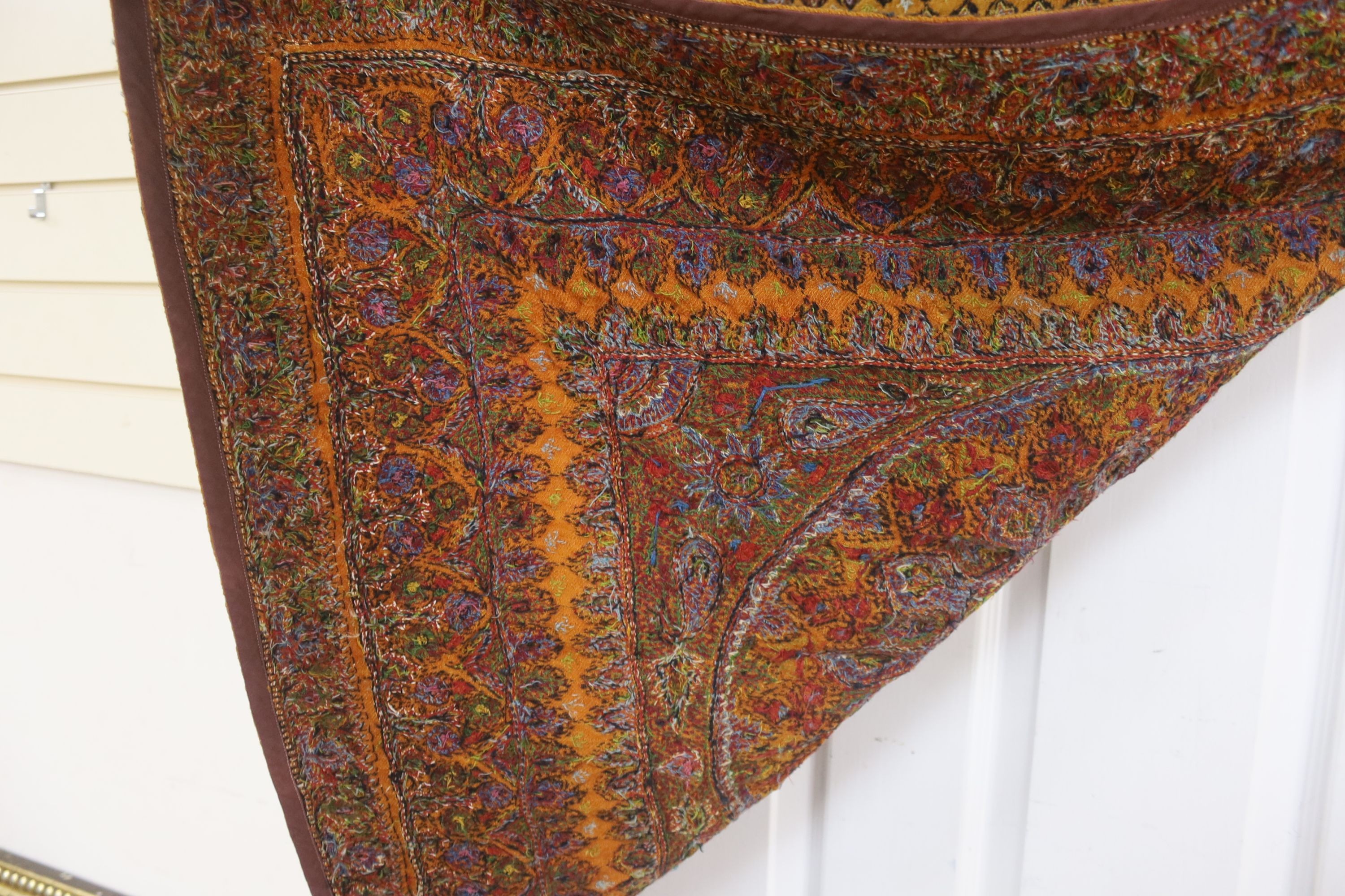 A Kashmiri wool embroidered hanging, with central cartouche,, 97 cms wide x 99 cms high. - Image 2 of 2