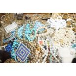 A large quantity of mixed costume jewellery.