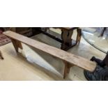 A pair of 19th century pine benches. Length-220cm, Depth-21, Height - 45cm.