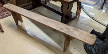 A pair of 19th century pine benches. Length-220cm, Depth-21, Height - 45cm.