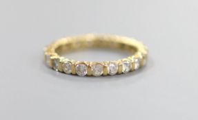 A modern 18ct gold and diamond set full eternity ring, size P, gross weight 3.8 grams.