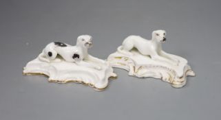 Two similar Staffordshire porcelain models of recumbent setters, c.1830-50, 12cm longProvenance -