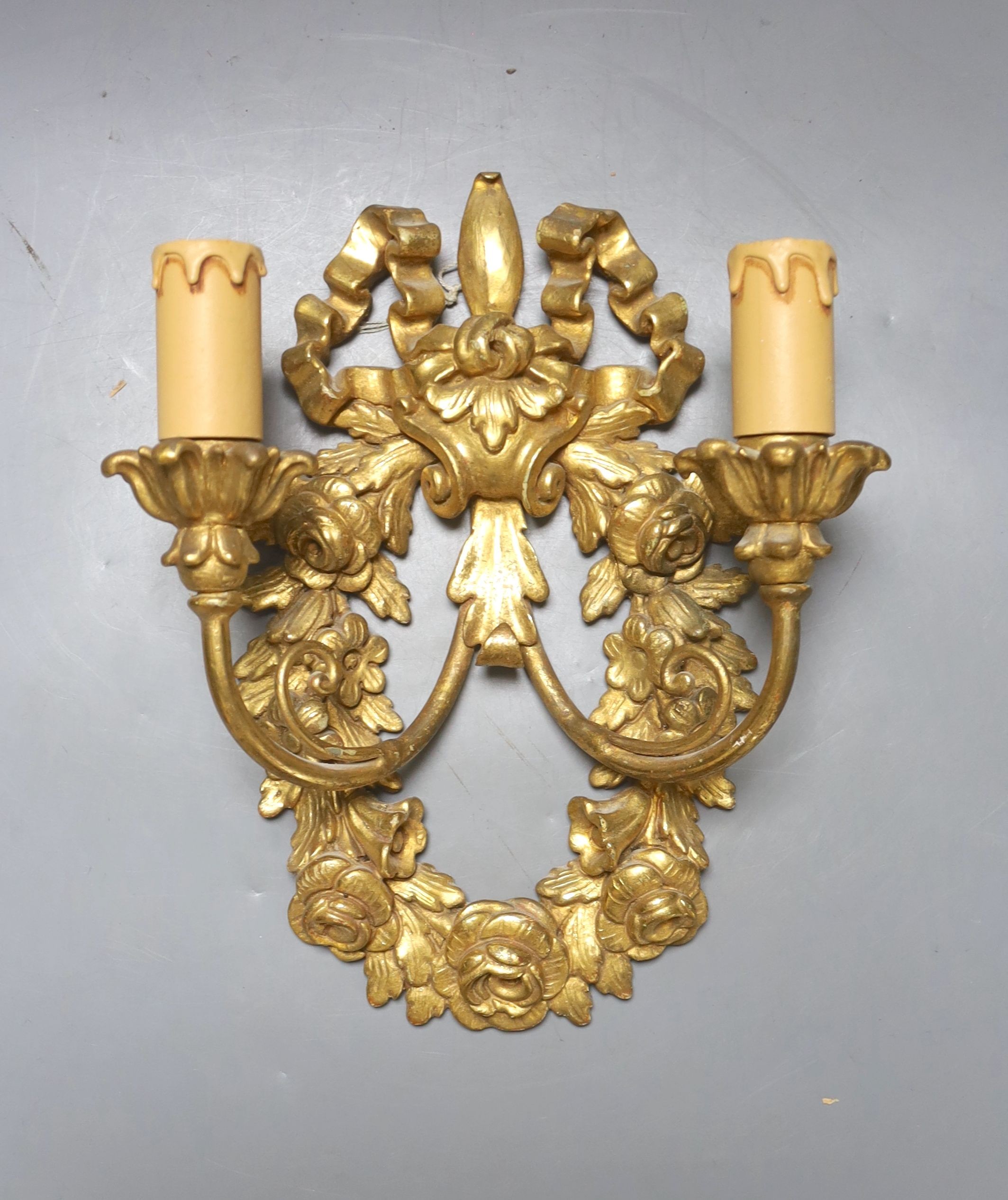 Two pairs of 18th century style Italian giltwood two branch wall lights and one other wall light, 62