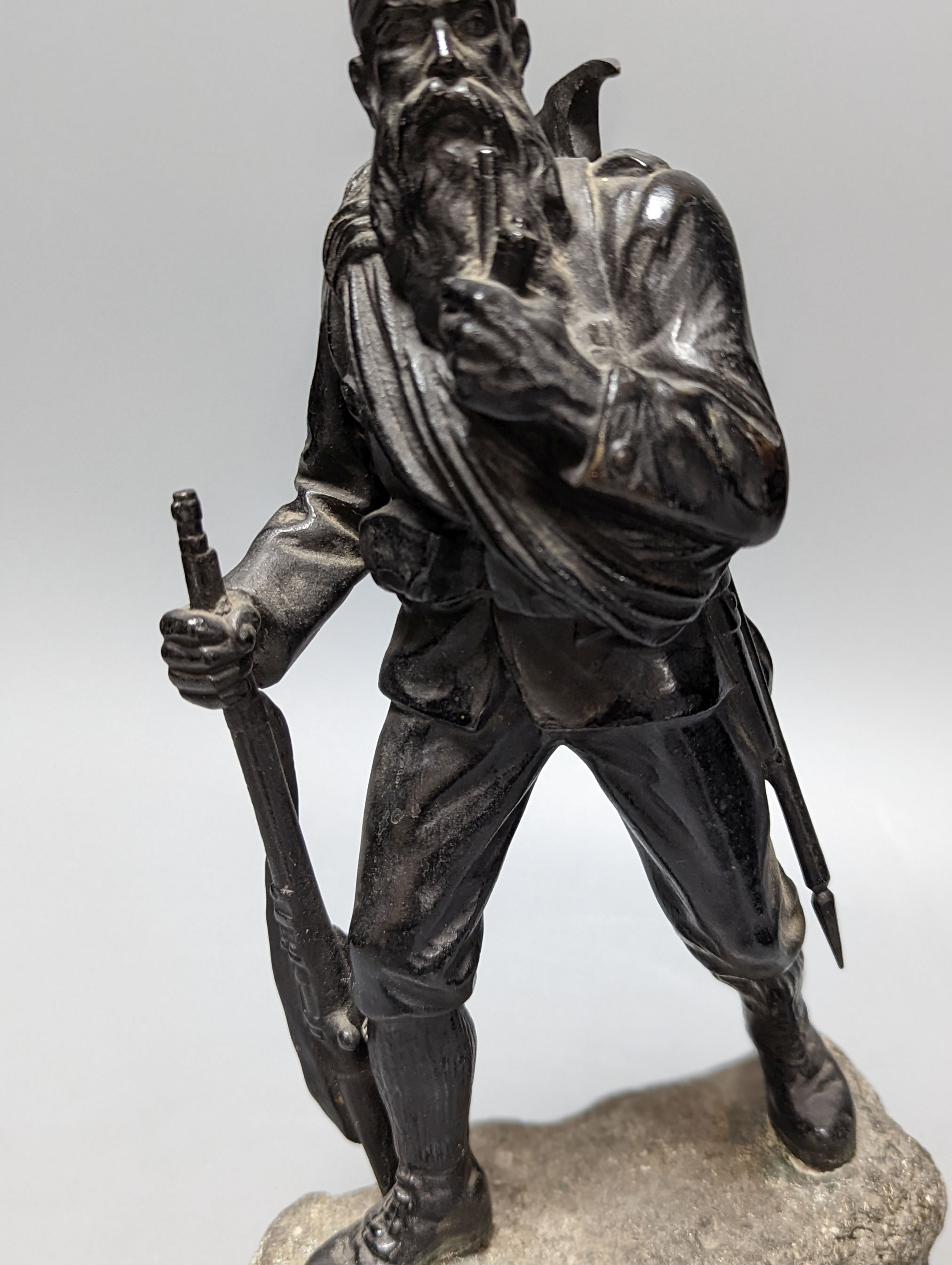 A WW1 period bronze figure of an Austrian soldier, 30 cms high including stone base. - Image 3 of 6