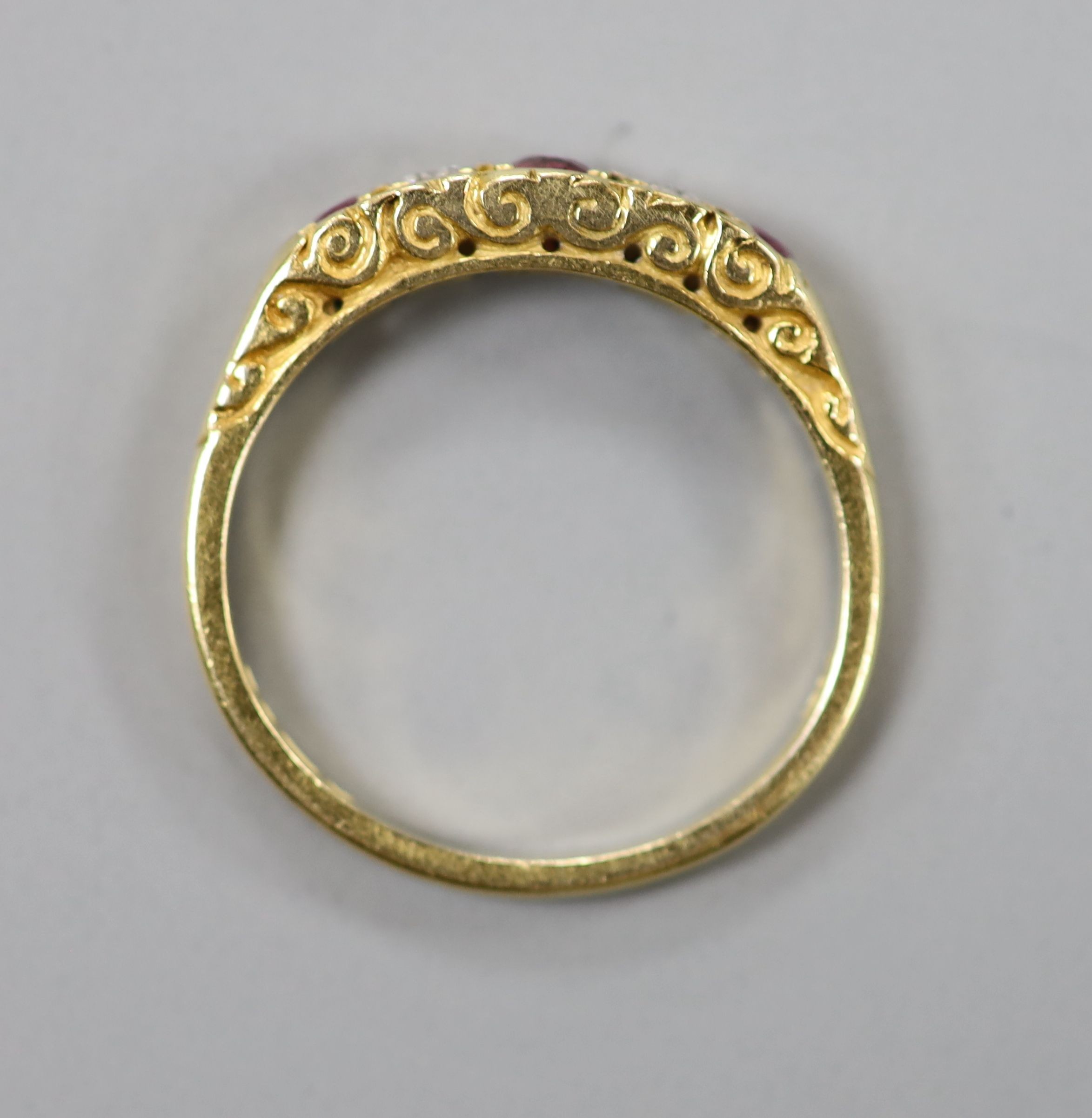 A modern 18ct gold, two stone diamond and three stone ruby half hoop ring, size O, gross weight 3. - Image 3 of 3