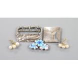 A French Art Nouveau style white metal buckle, a pair of 14k yellow metal and cultured pearl cluster