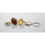 Three assorted 9ct gold and gem set rings including garnet and citrine, gross 11.4 grams, a yellow