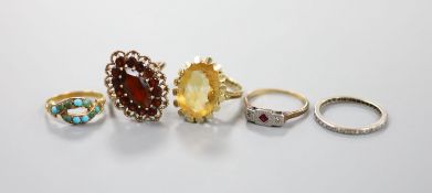 Three assorted 9ct gold and gem set rings including garnet and citrine, gross 11.4 grams, a yellow