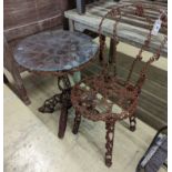 A reclaimed metal table and chair (chair a.f.) table measurements, D-54cm, H-66cm.