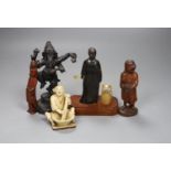 A Chinese horn figure of a lady, 14.3 cm high, two carved wood figures and A Japanese pottery seated