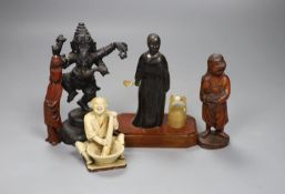 A Chinese horn figure of a lady, 14.3 cm high, two carved wood figures and A Japanese pottery seated