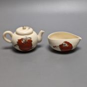 A Japanese pottery 'Daruma' teapot and pouring jug, circa 1900