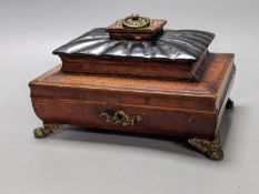 A George IV tooled Morocco leather box, with a silk printed cartouche to interior of the lid, 22 cms