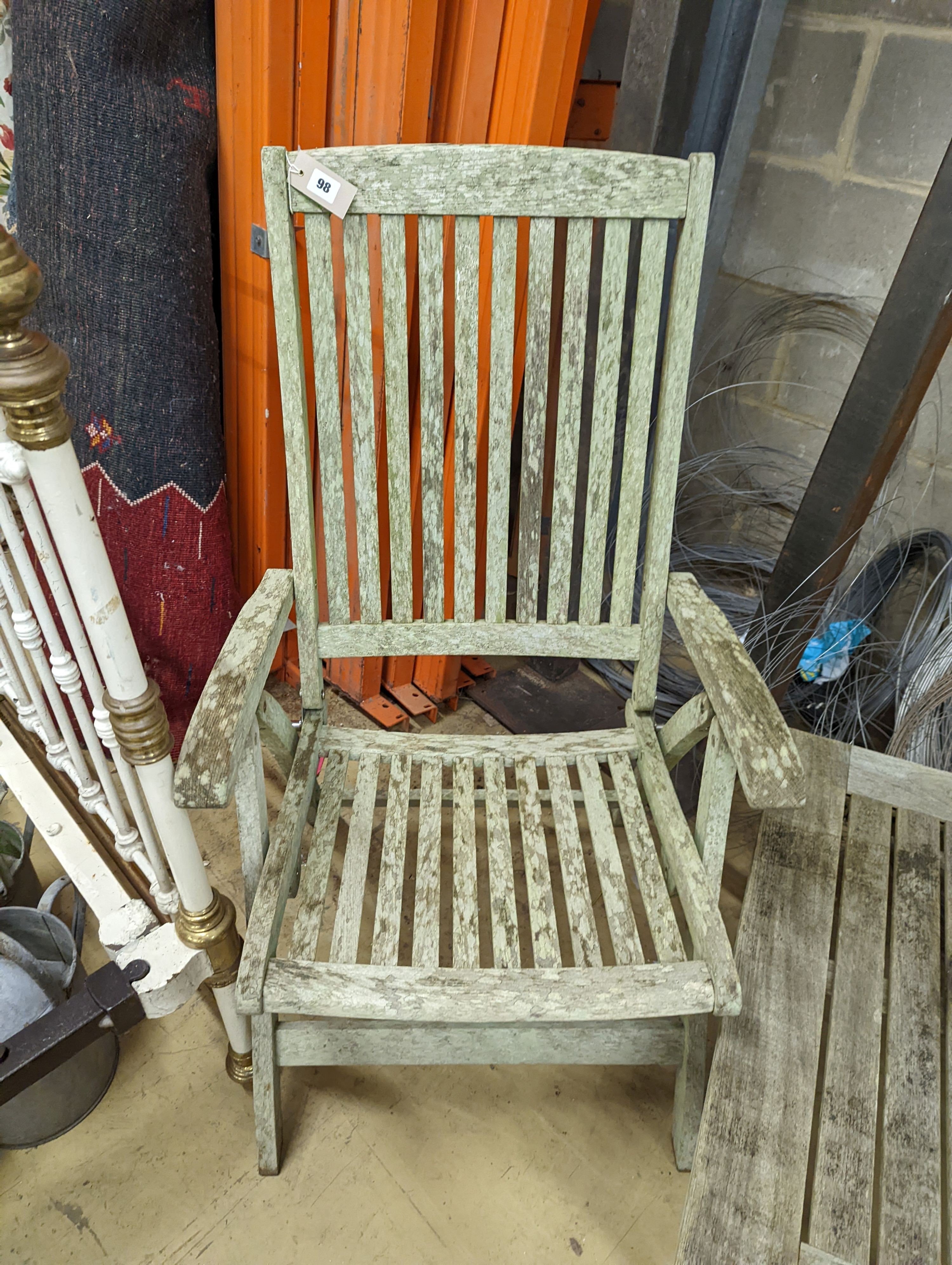 Two weathered teak folding garden armchairs and a low table - Image 2 of 5