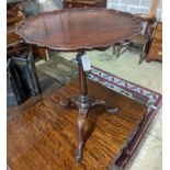 A George III and later mahogany Tripod Wine Table. Diameter - 49cm, Height - 67cm.