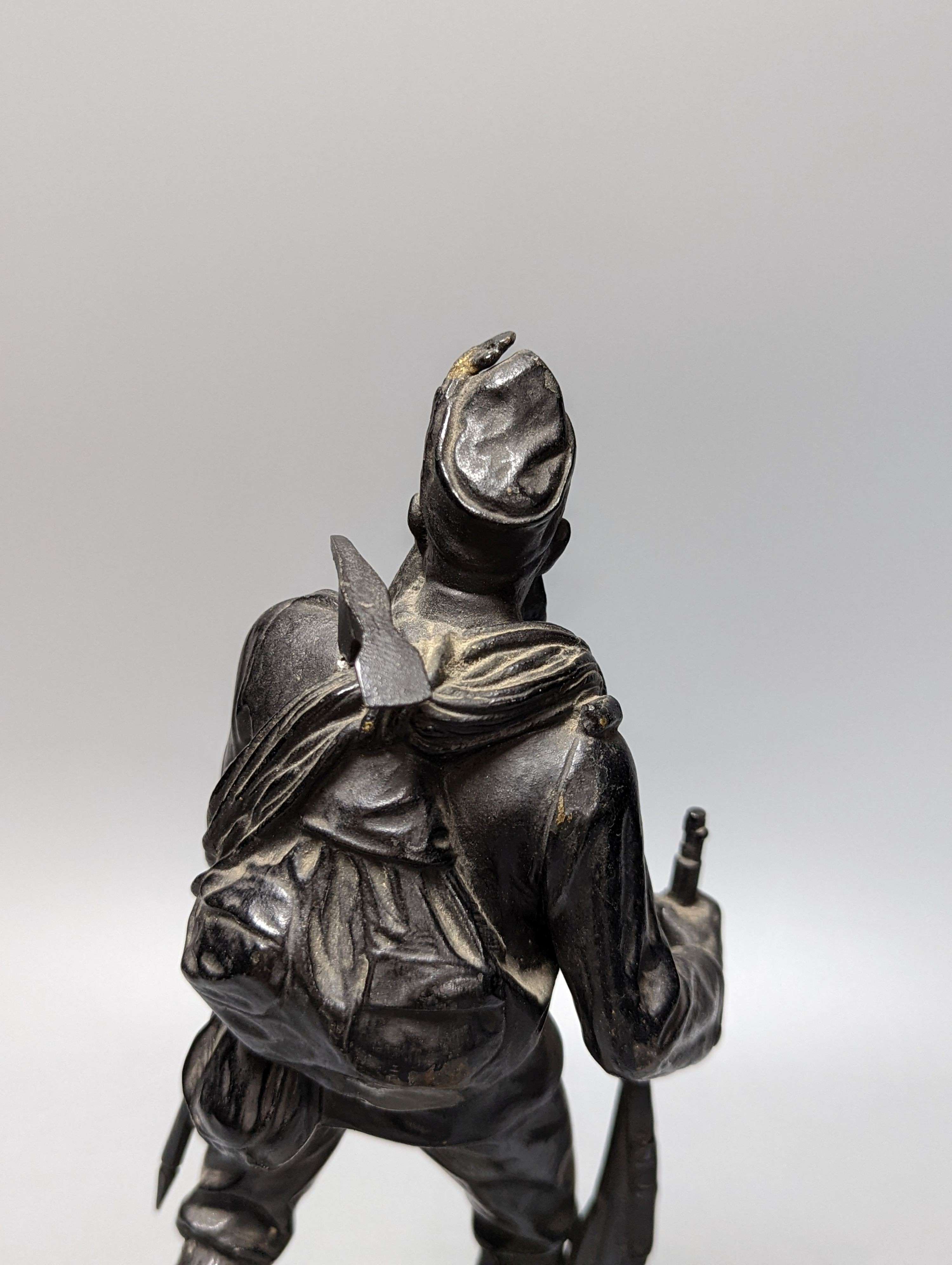 A WW1 period bronze figure of an Austrian soldier, 30 cms high including stone base. - Image 5 of 6