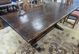 A 17th century style rectangular oak refectory dining table. Length -183cm, Width-91cm, Height-