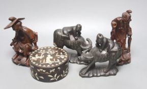 Four Chinese carved wood figures and a box, 18 cms high.