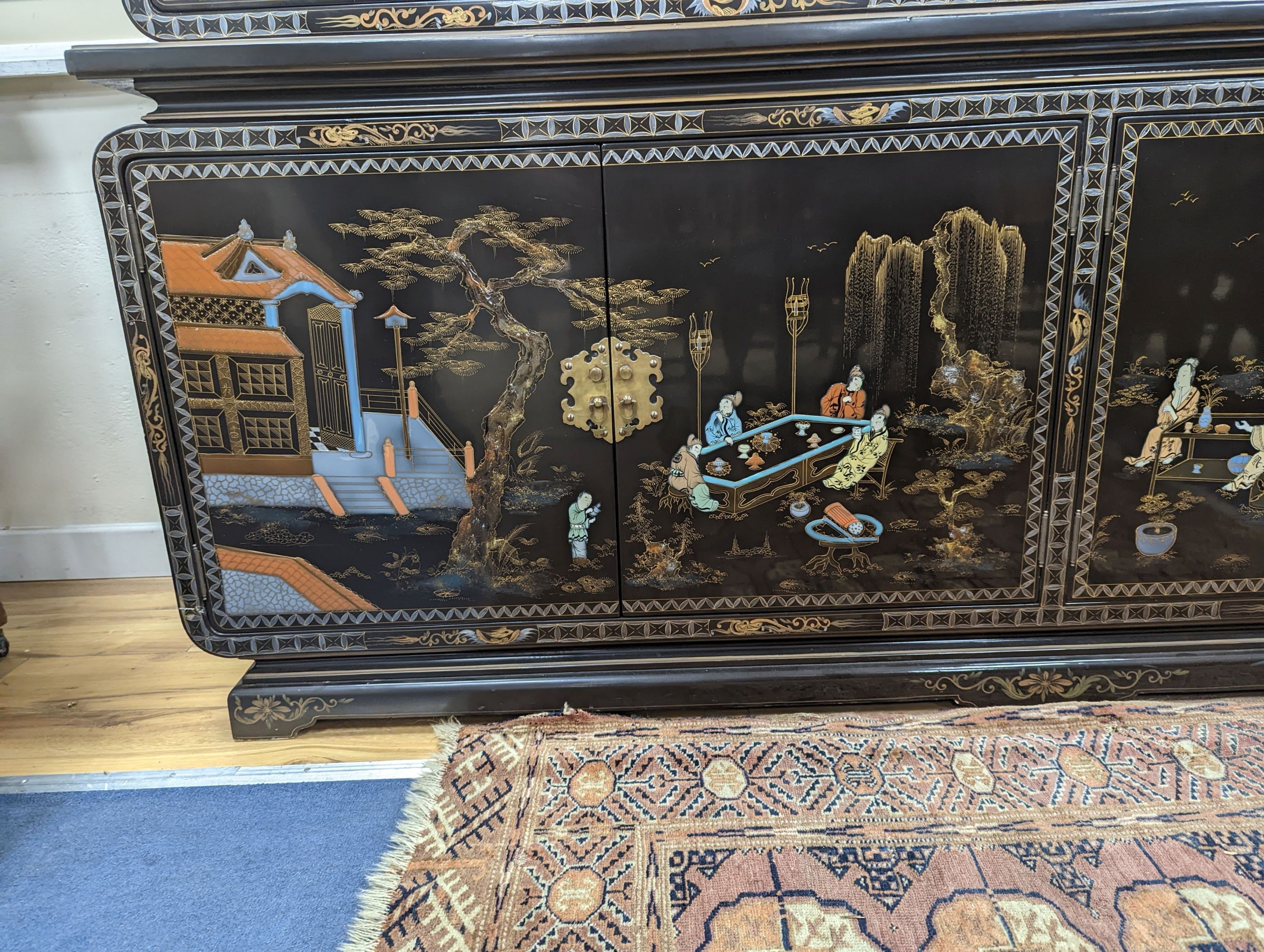 A Chinese lacquer decorated cabinet. W-200cm, D-45cm, H-201cm. - Image 2 of 4