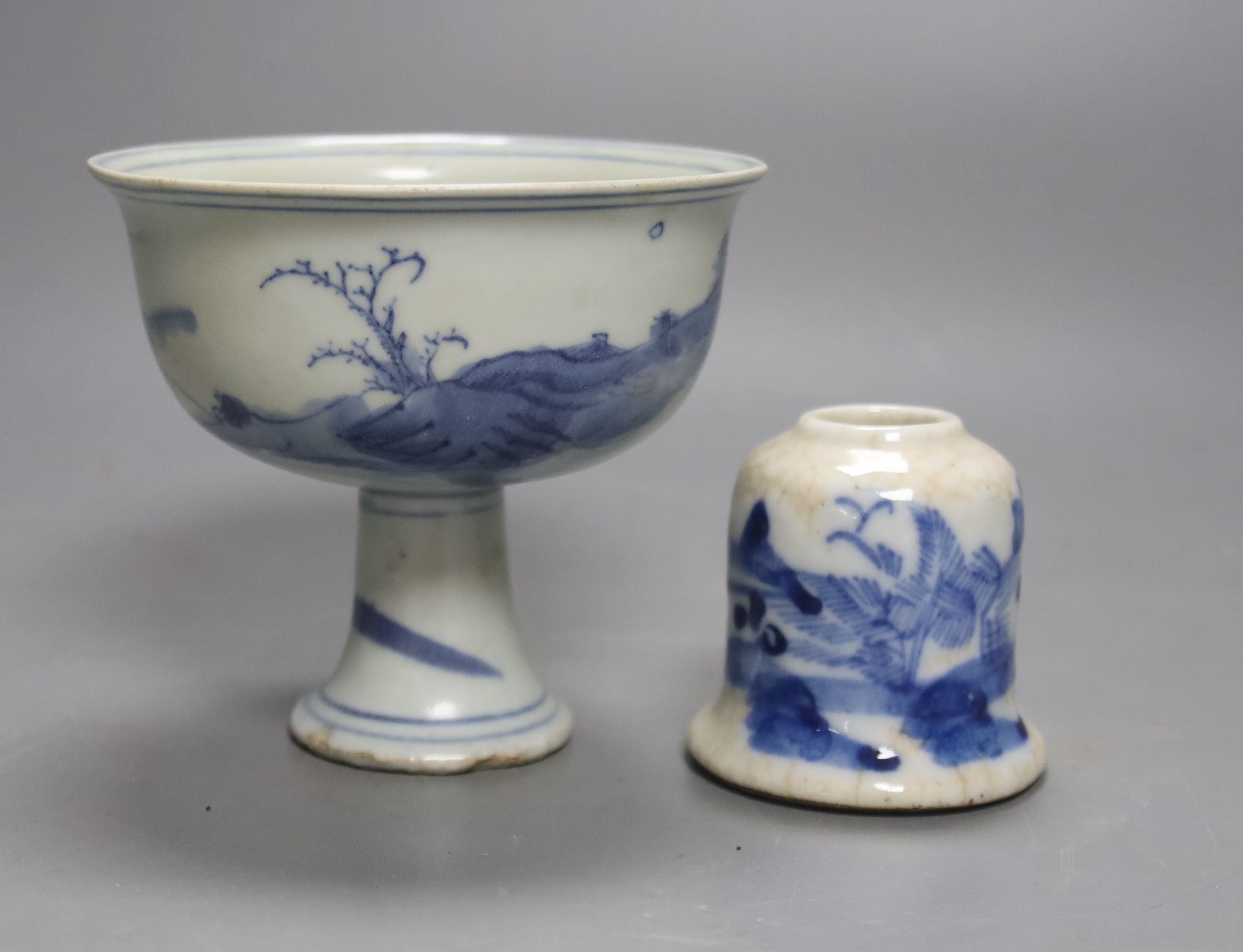A Chinese stem cup and blue and white brush pot, cup 9 cms high.