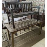 A weathered teak garden bench and rectangular table. Bench - W-122cm, D-54cm, H-83cm. Table - W-