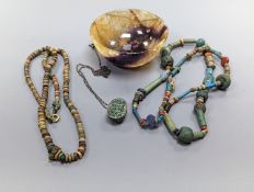 An ancient Egyptian faience and hardstone bead and scarab necklace and a small blue John bowl, 7cm