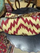 A roll of flatweave fabric with chevron design, width 130cm