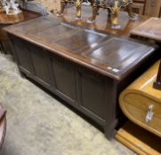 An 18th century panelled oak coffer, length 168cm, depth 63cm, height 75cm