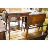 An Edwardian banded mahogany fold-over top table, 51 cm wide, 36 cm deep, 71.5 cm high and a