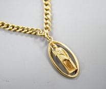 A 9ct curb link chain, 44cm, 15.7 grams, with a yellow metal St. Christopher pendant, engraved '18',