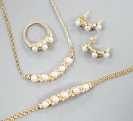 A modern matching suite of 14k yellow metal, cultured pearl and diamond chip set jewellery,