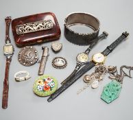 An engraved silver bangle, two silver brooches, including Scottish, two lady's wrist watches and a