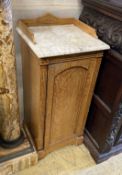 A Victorian Hungarian ash marble-topped bedside cupboard, width 38cm, depth 36cm, height 86cm