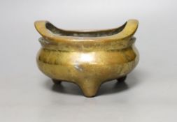 A Chinese bronze ding censer, Xuande mark but later, diameter 14cm