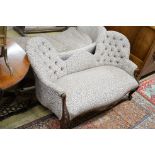 A Victorian and later walnut button back upholstered salon settee, with cabriole legs fitted ceramic