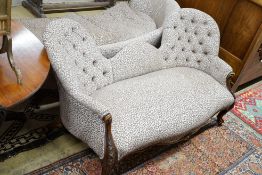 A Victorian and later walnut button back upholstered salon settee, with cabriole legs fitted ceramic