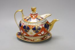 A Barr Flight and Barr Worcester teapot cover and stand painted with an Imari pattern, c.1805, 23 cm