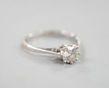 A modern 18ct white gold and solitaire diamond ring, size N, gross weight 2.2 grams, the stone