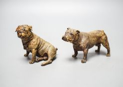 Two cold painted bronzes, a pug and a bulldog, with applied discs reading ‘GESCHUTZT’. 14cm