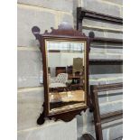 A George III mahogany fret frame wall mirror, height 63cm, width 39cm