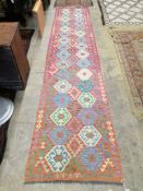 A Kilim runner, 401 x 80cm