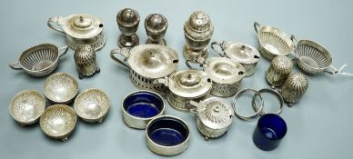 A mixed group of assorted mainly early 20th century silver condiments, including mustard pots, salts
