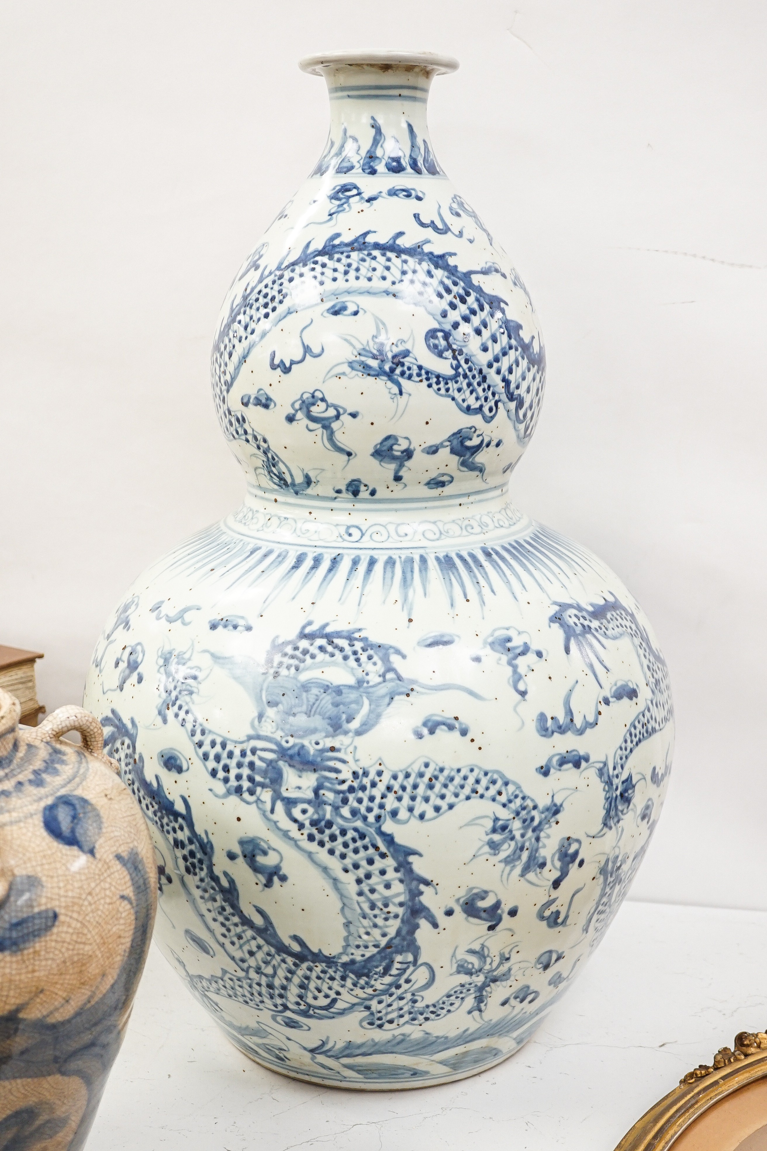 A large Chinese blue and white 'dragon' double gourd vase, 64cm high and an Annamesse style blue and - Image 8 of 13